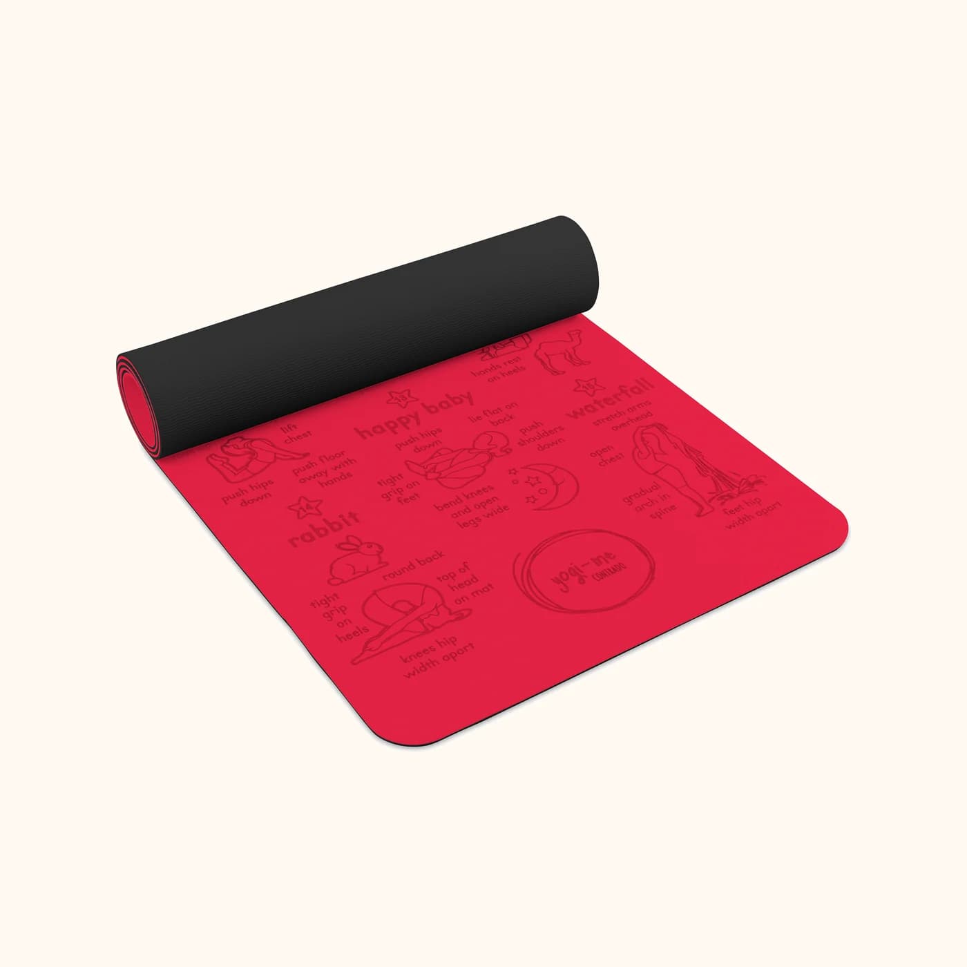 Freedom Flow kids' yoga mat in red: The mat part-rolled, showing its thickness and the grey underside
